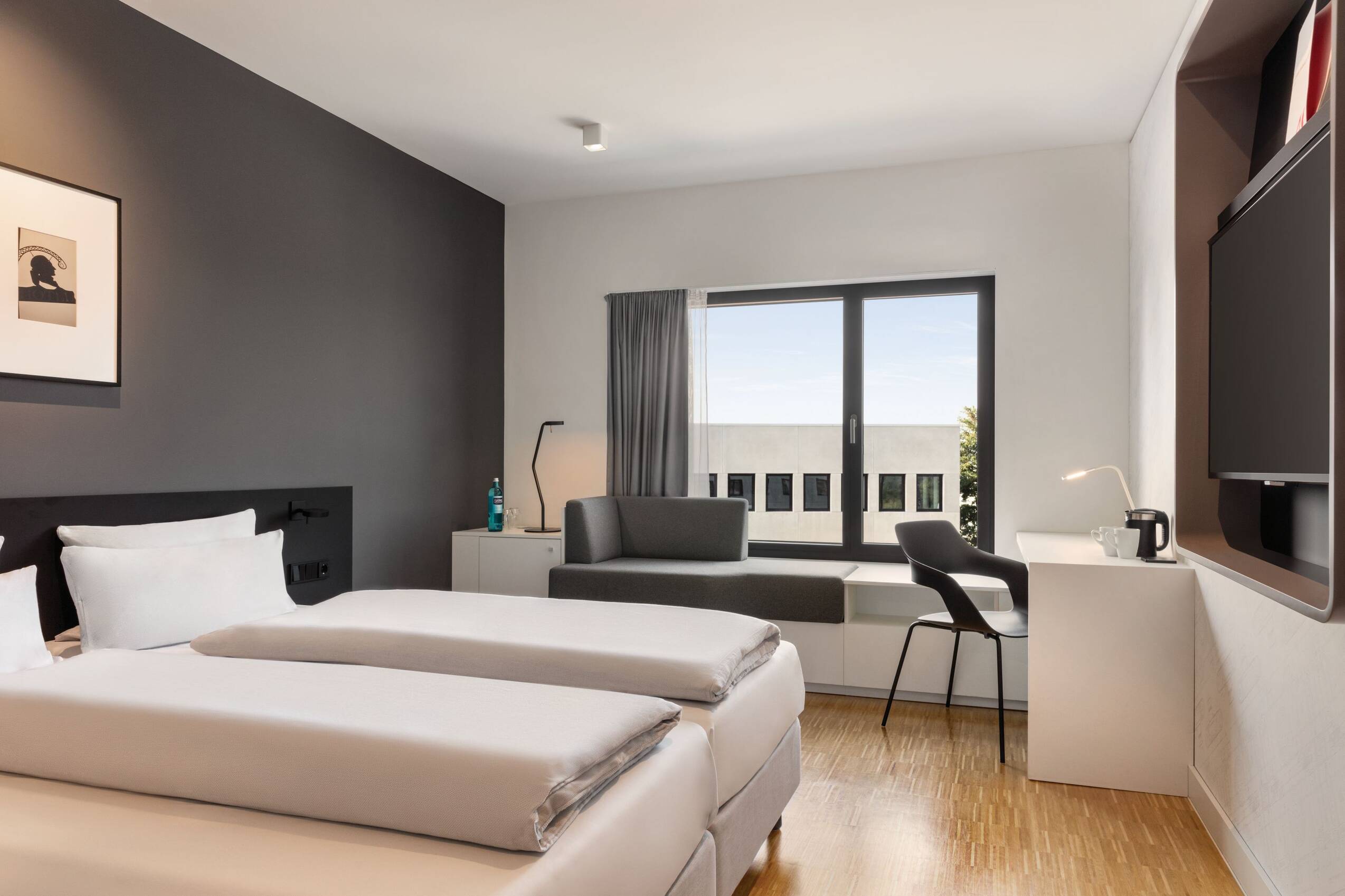 Standard room with two single beds.