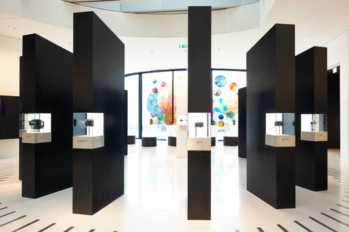 Various Leica models are stylishly displayed in the Leica World.